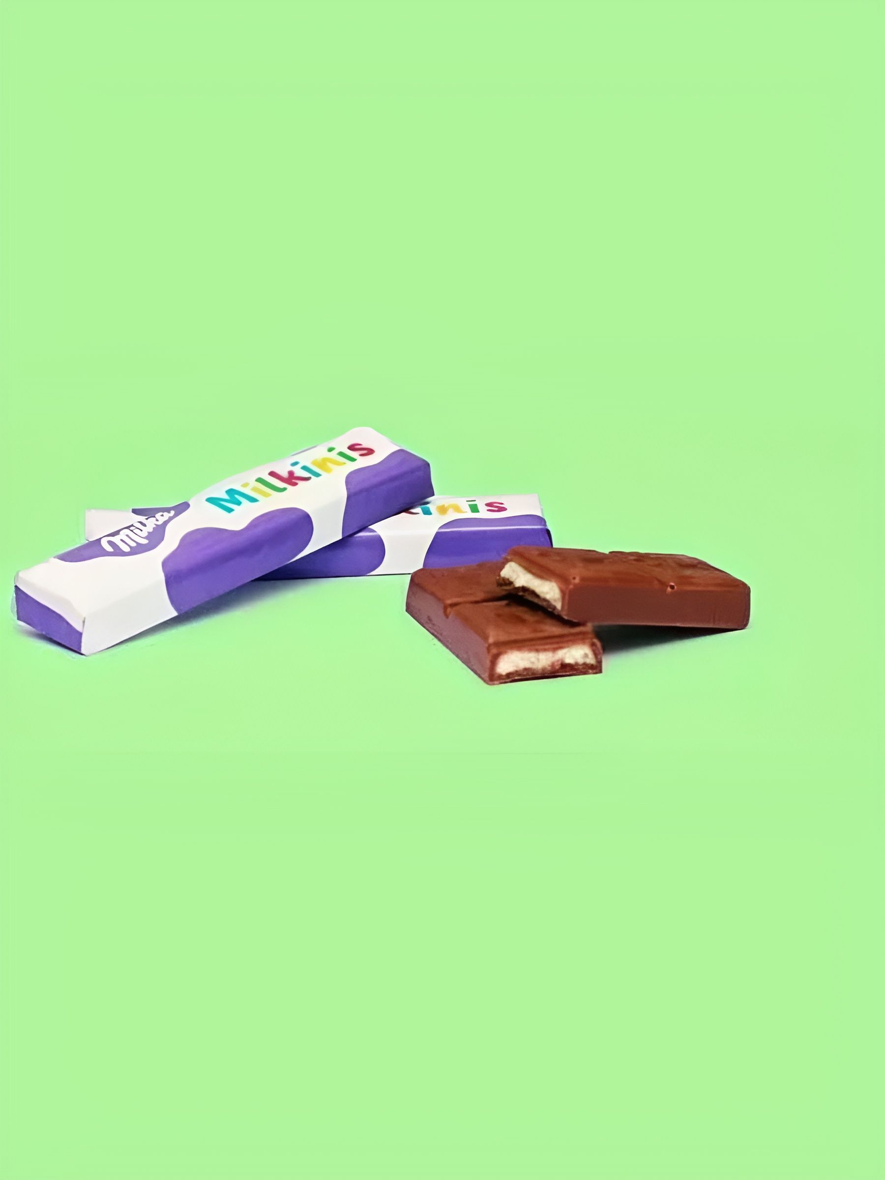 Шоколад молочный Milka Milkinis с молочно-кремовой начинкой, 87.5 г. 8 шт.