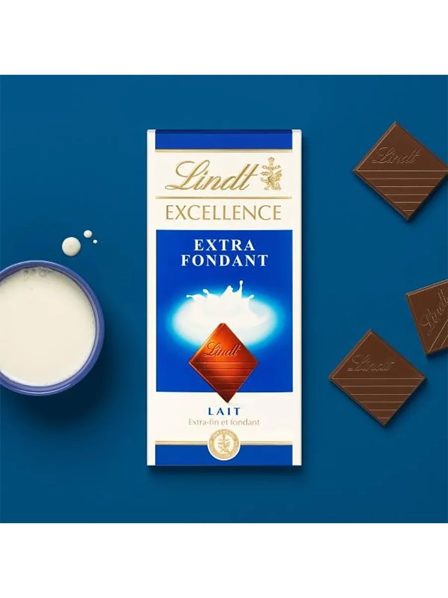 Молочный шоколад Lindt Extra Fondant, 100г.